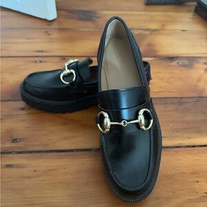 H&M Glossy Black Loafers with Gold Accent